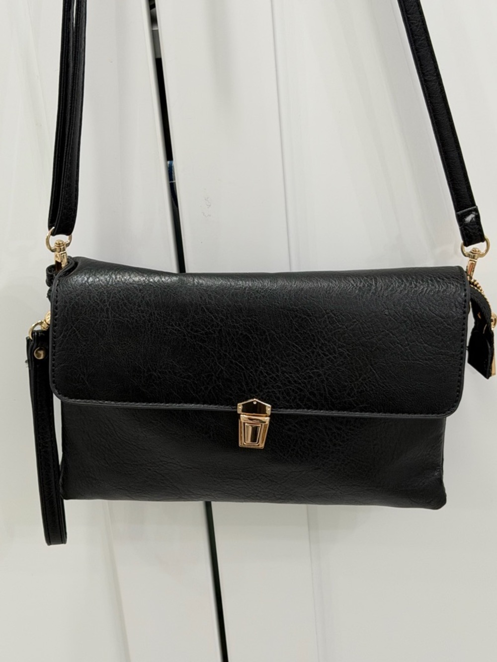 Isabelle Black Leather Crossbody Bag with Gold Closure